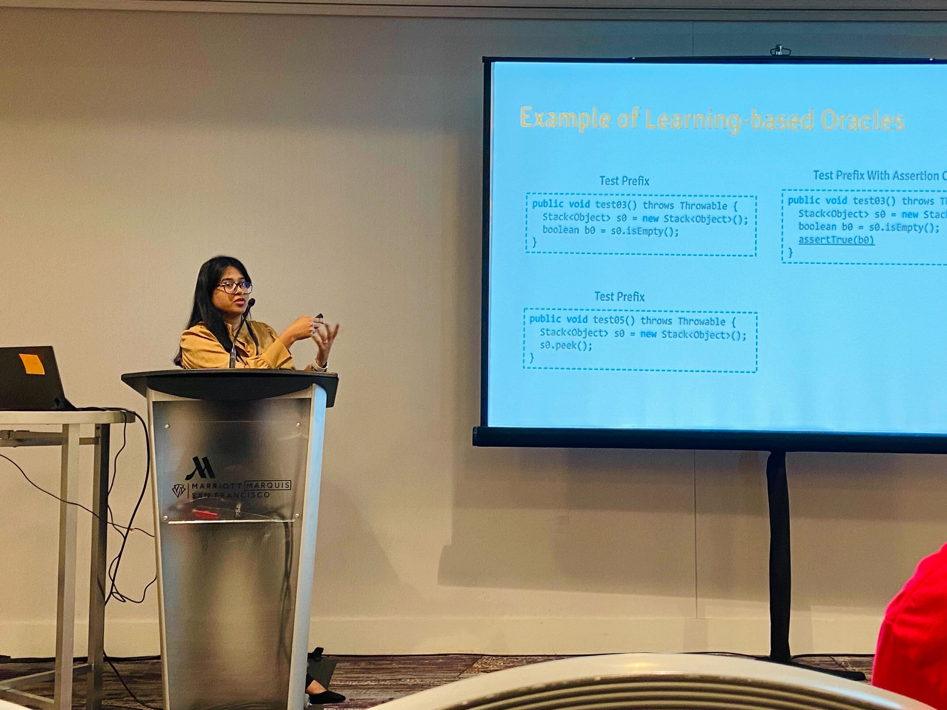 Soneya presents her research titled _Neural-Based Test Oracle Generation: A Large-scale Evaluation and Lessons Learned_ at FSE 2023.